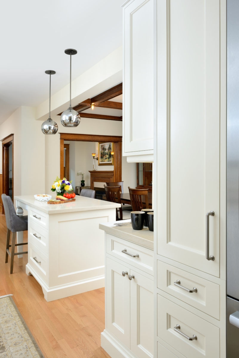 Open Concept kitchen with view of original wood trim.