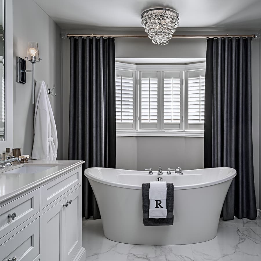 bathroom with new tub after renovation