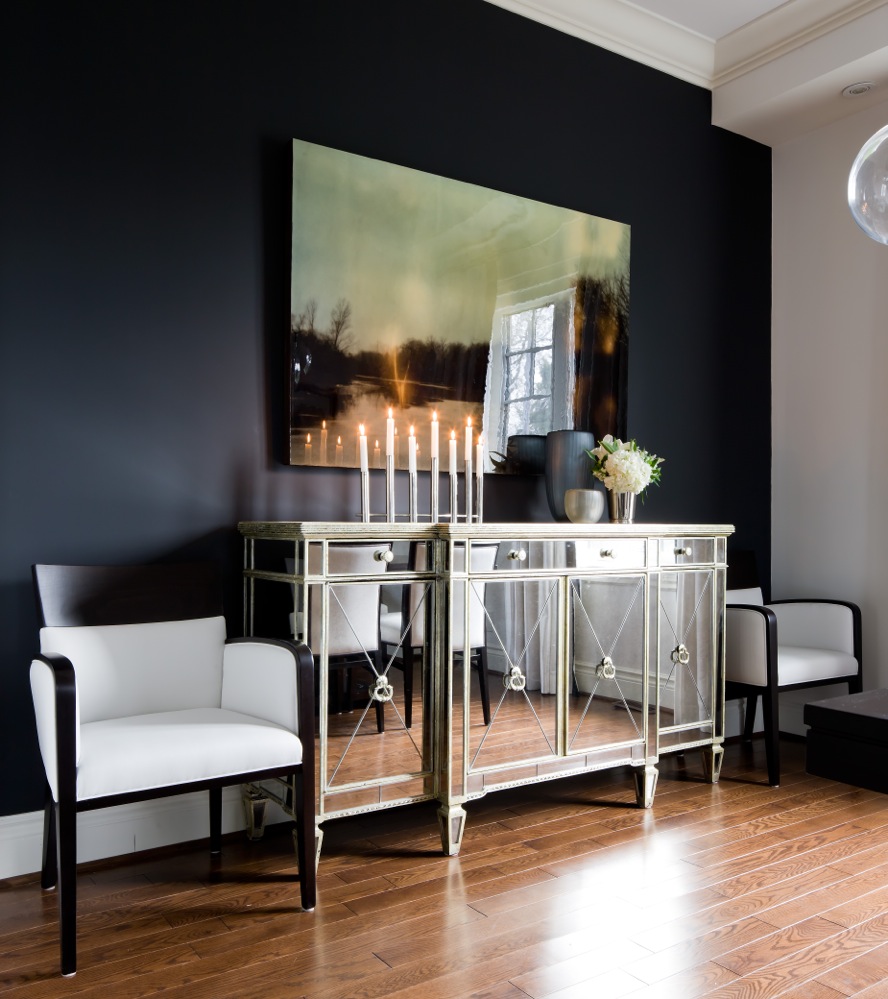 Black accent wall in dining room