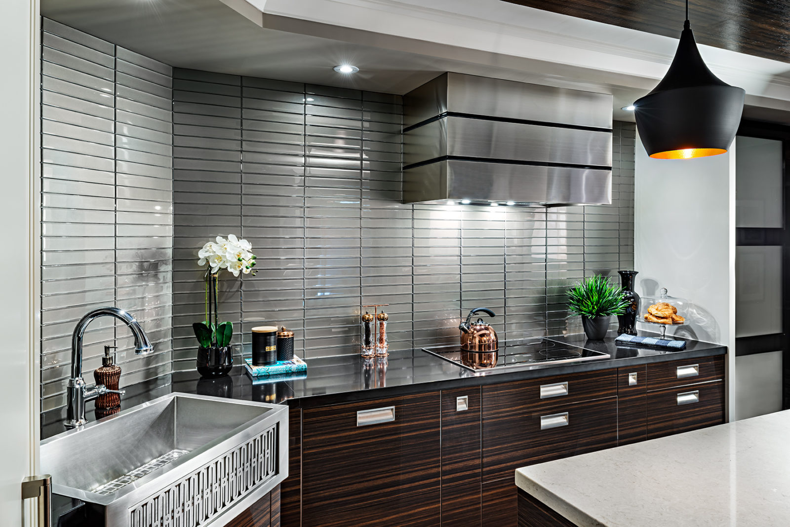 Mixing metal fixtures and accents in a contemporary kitchen