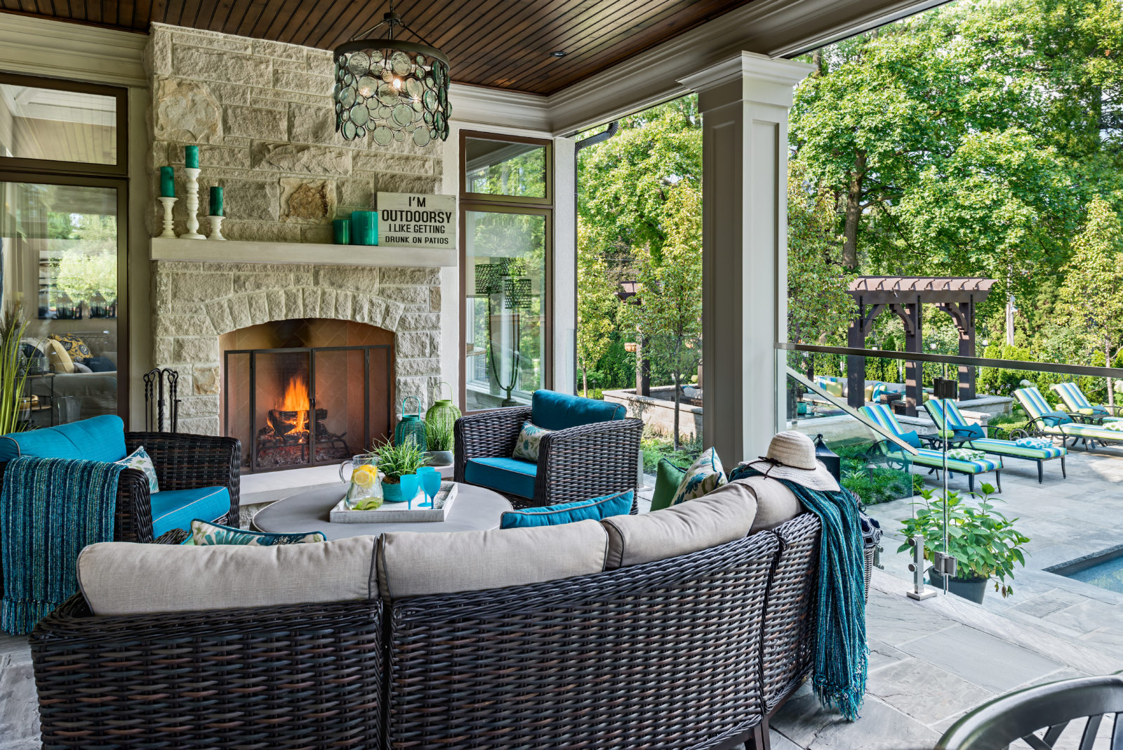 patio furniture by the outdoor fireplace