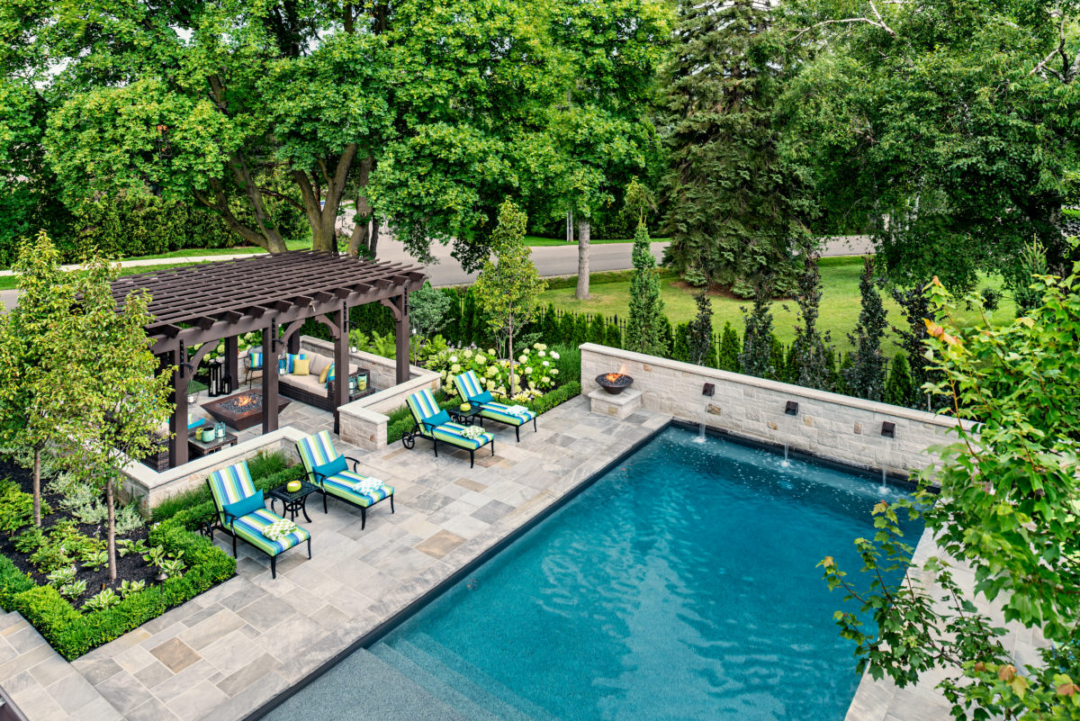 brightly coloured lounge chairs in Sunbrella fabric by the pool