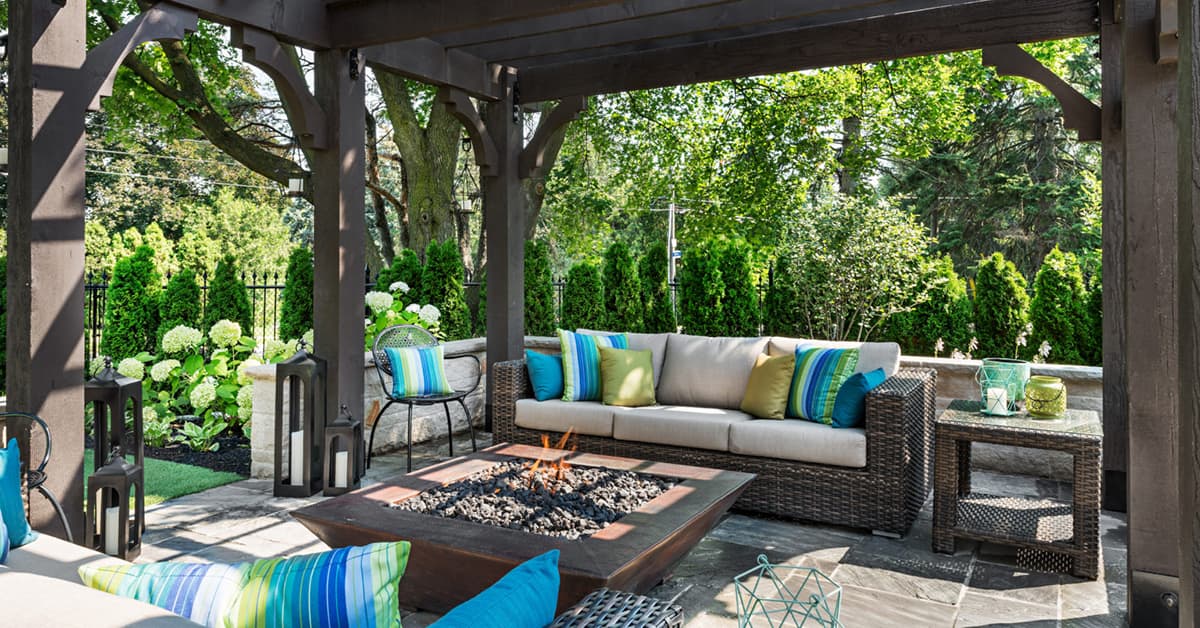 Arbor outdoor fire pit with colourful cushions