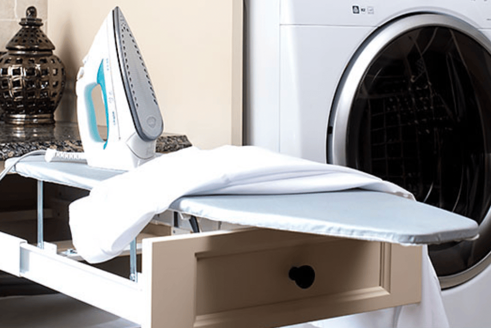 The hottest laundry room design trends Ironing board in a drawer