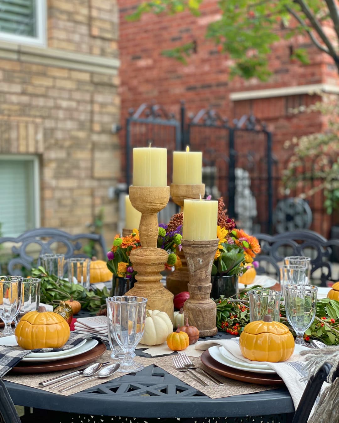 fall candles on Thanksgiving table