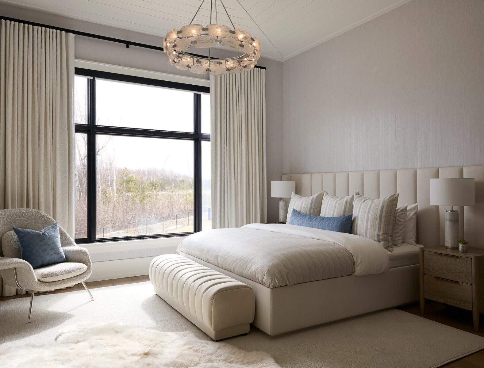 curved chair, ottoman and bed