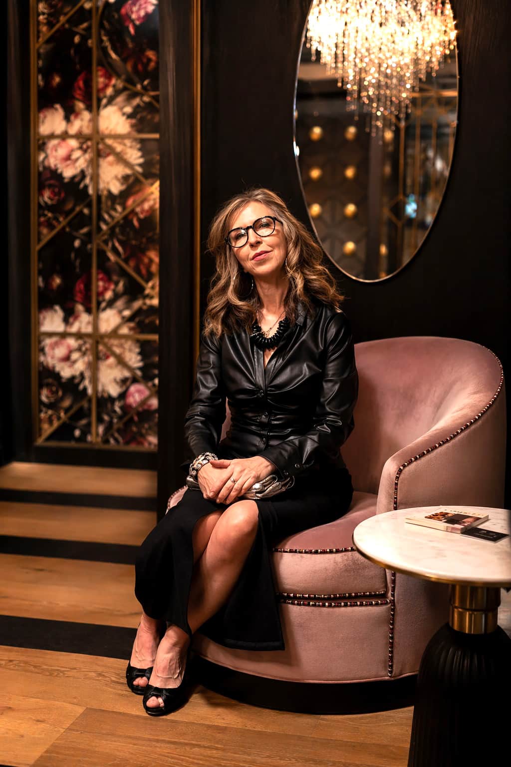 Jane Lockhart sitting in Booth 305 at Living Luxe Design Show