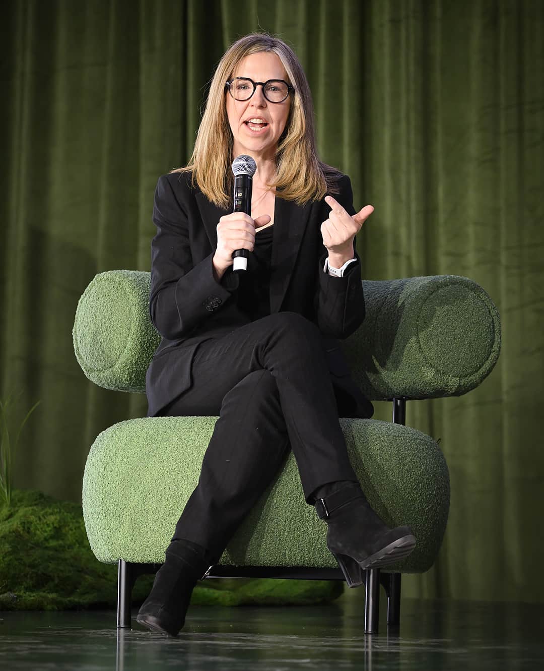 Jane on stage speaking at Living Luxe Design Show 2026