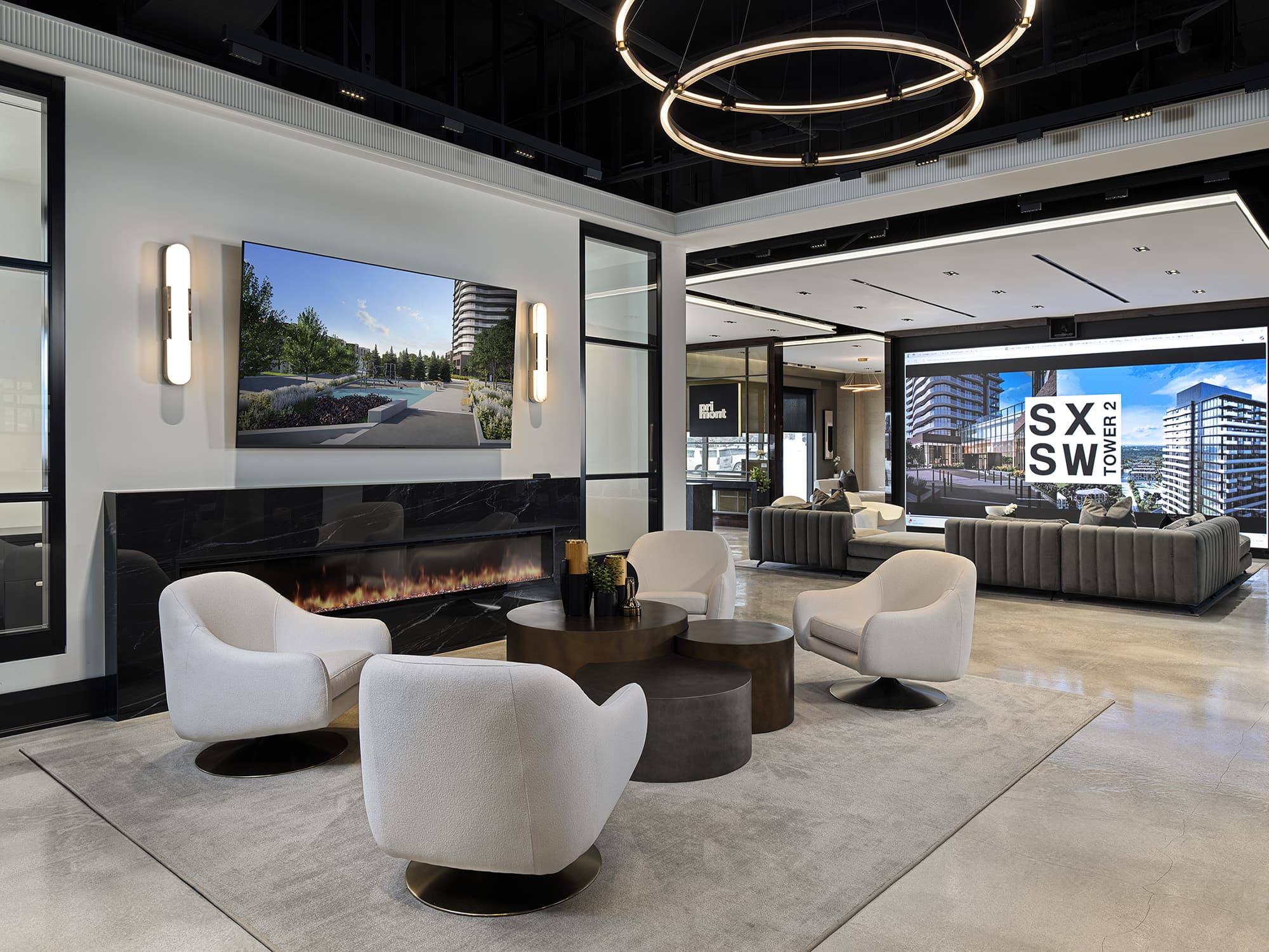 Modern lounge seating with fireplace and SXSW media wall at the Primont XC presentation centre
