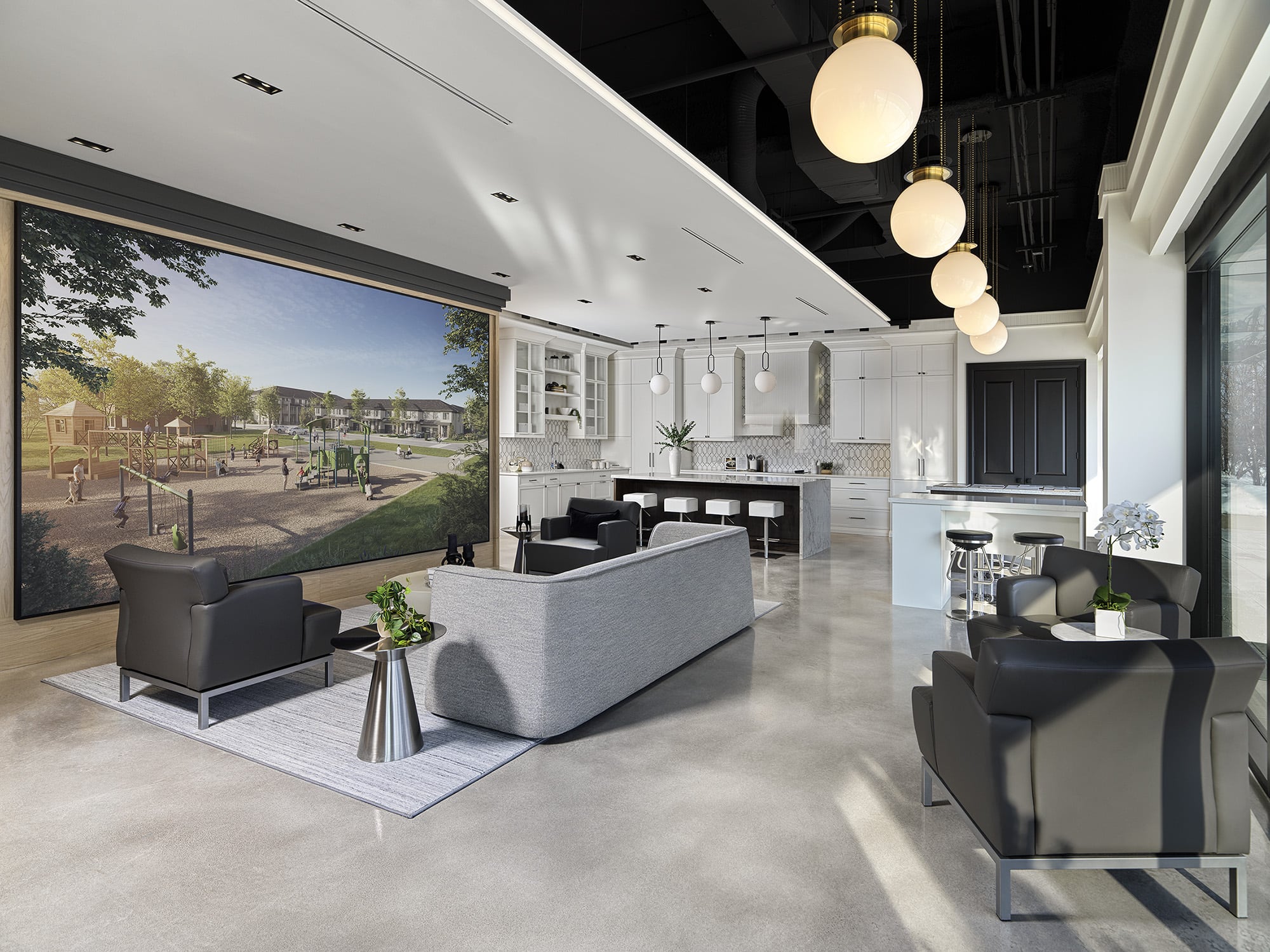 Contemporary kitchen and lounge area at the Primont Experience Centre featuring a media wall, marble island, and modern lounge seating