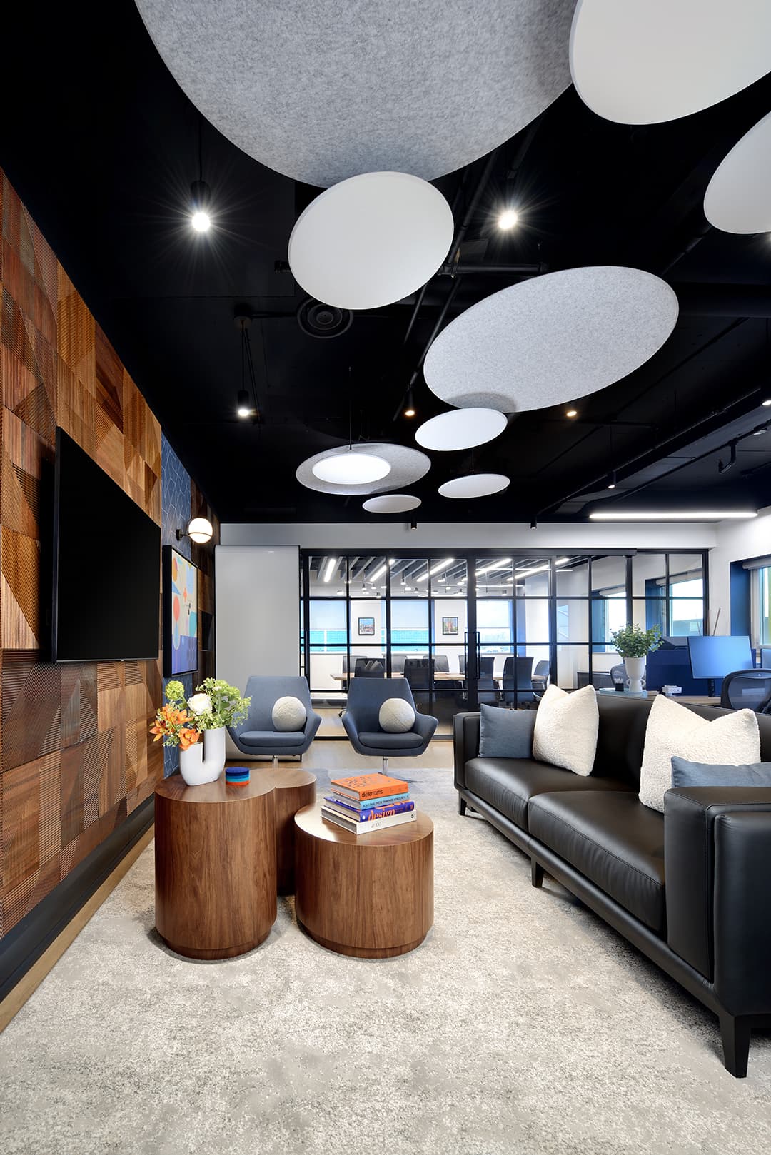 3 side tables, dark leather sofa, tv