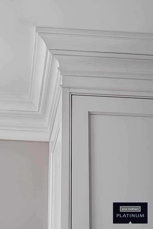 White crown moulding and cabinetry detail