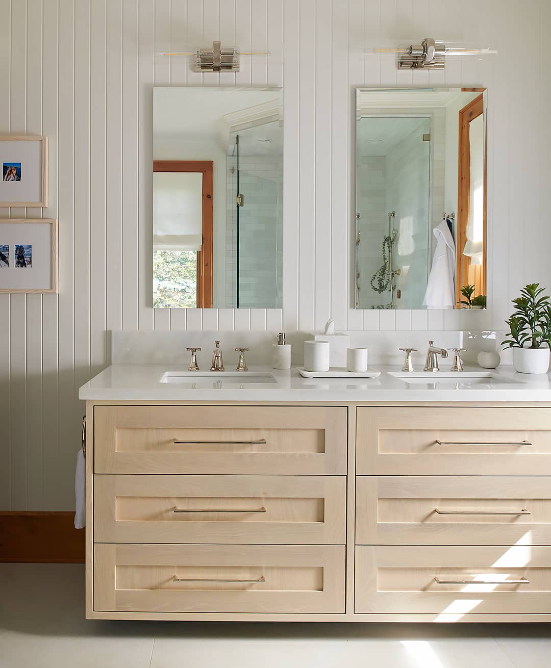 bathroom vanity, two sinks, two mirrors