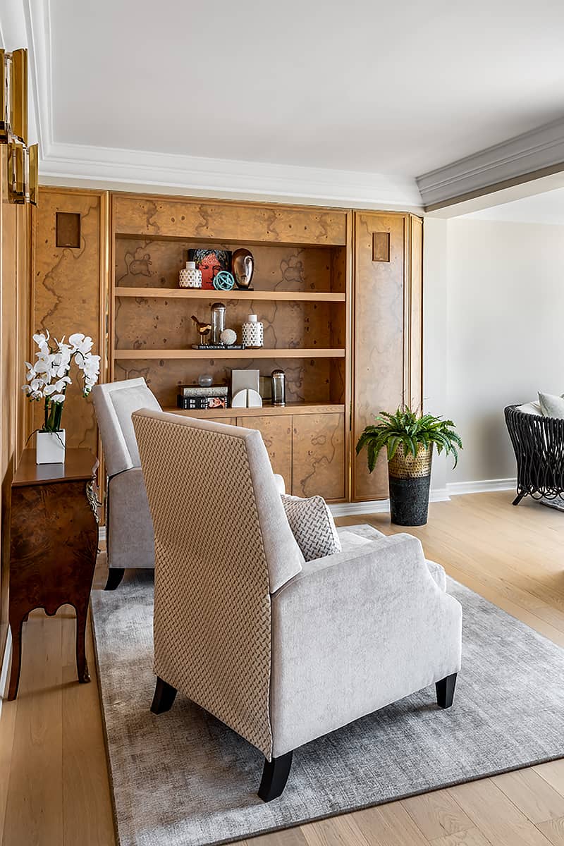 living room, two chairs, built-in bookcase