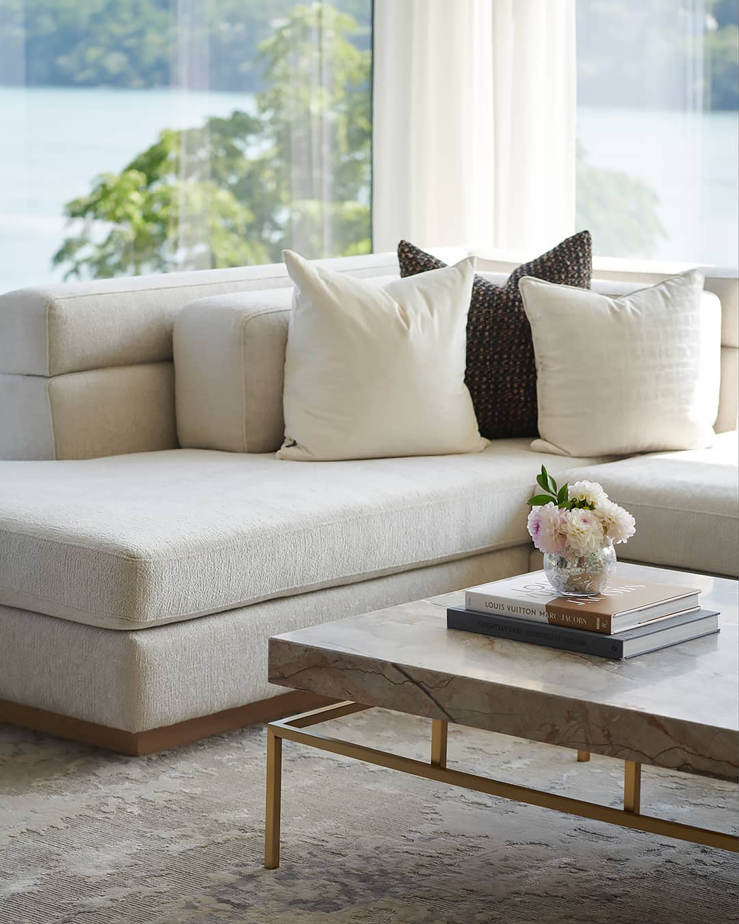 white sectional and coffee table