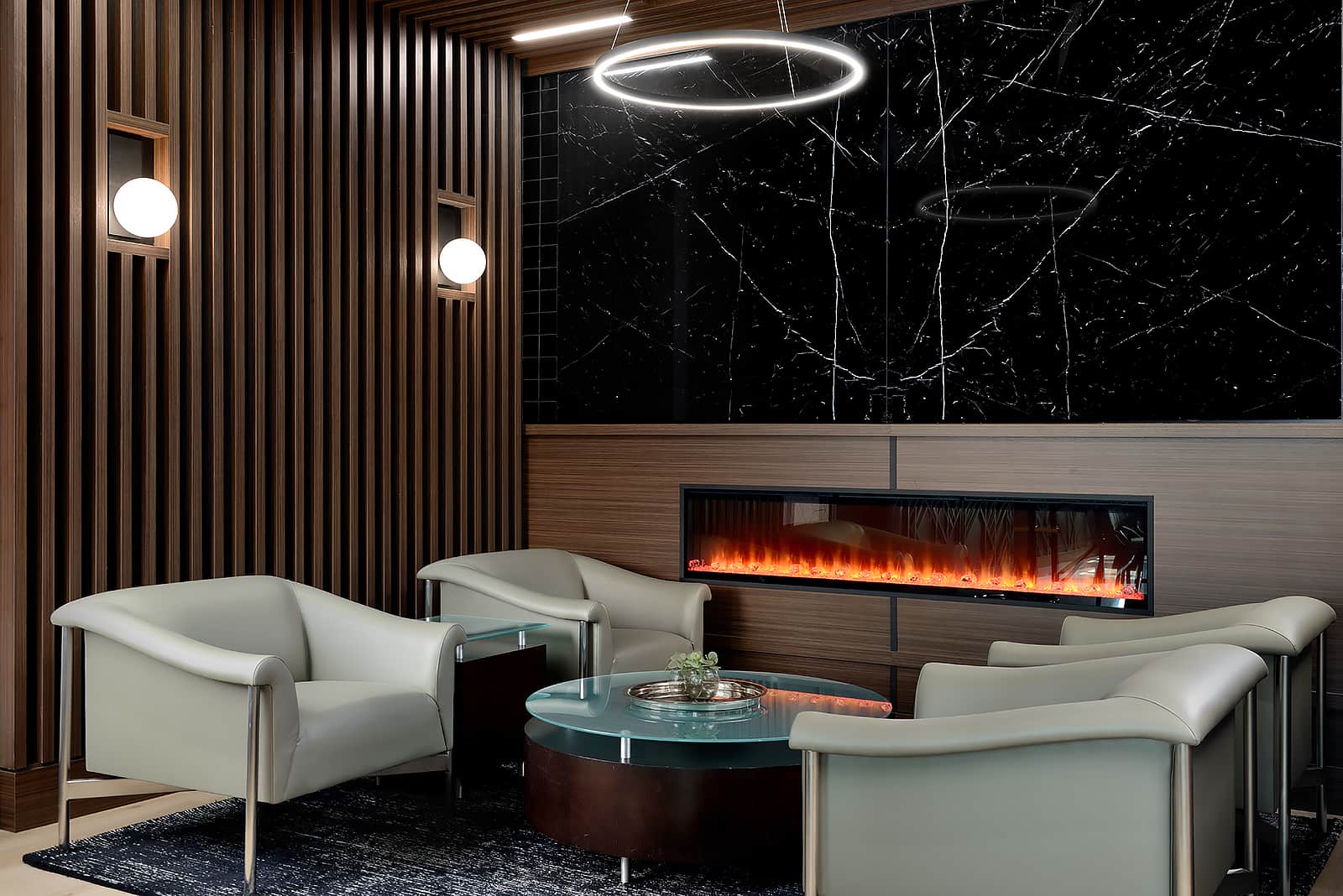 4 cream colored leather chairs in front of fireplace