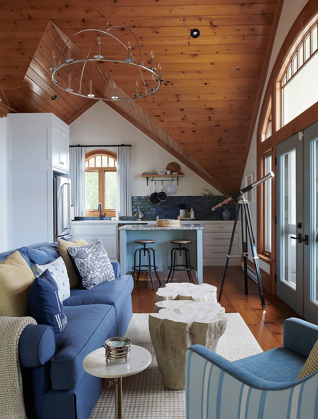 blue sofa chair fridge, stools, telescope